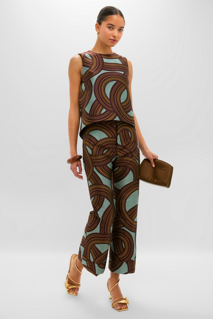 Model wearing the Montecarlo Jacquard Hendrix Pants, a classic, high-waisted, ankle-length trouser with a relaxed fit, styled effortlessly with a matching sleeveless top.