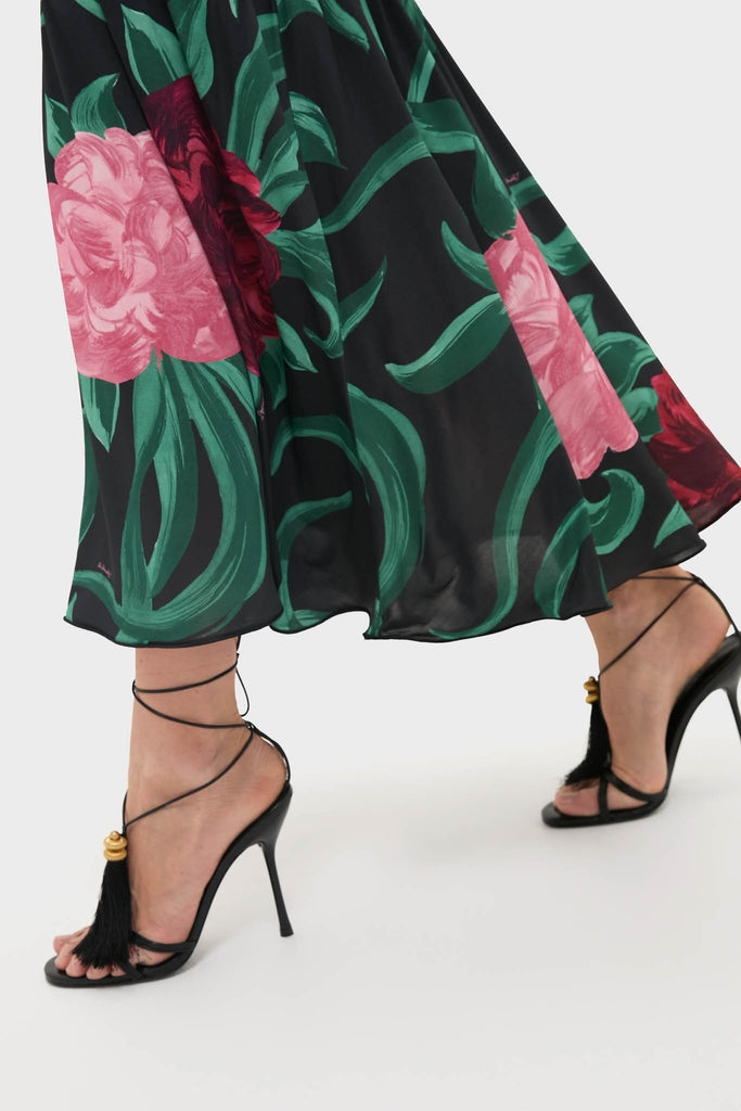 Peony Alba Dress: Classic midi dress with oversized floral print, paired with high-end strappy stiletto sandals. An effortless, fun choice for confident, stylish dressing.