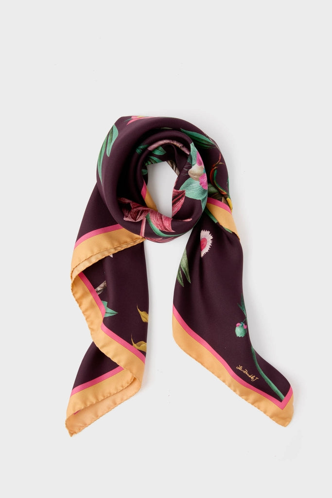 Zooflora Burgundy Foulard 90x90 Scarf: A classic, high-end silk scarf with an effortless floral design on deep plum, bordered by hot-pink and mustard-yellow stripes, featuring a fun, gold cursive signature.