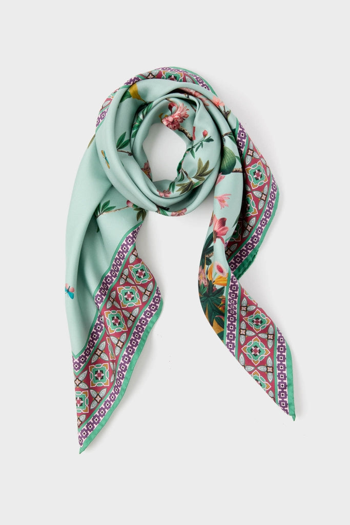 Zooflora Placee Foulard 90x90 Scarf featuring a mint-green floral design with vibrant geometric borders, offering a classic, effortless, and fun high-end accessory for versatile styling.