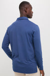 Back view of a man in a classic Navy Lyons Performance Jersey Long Sleeve Polo, showcasing effortless style with its athletic fit and high-end, fun design.