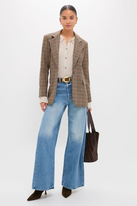Model in a classic, high-end outfit featuring the Folk Star The Pipe-Dream Button Sneak blazer, paired effortlessly with wide-leg jeans and fun, suede ankle boots.
