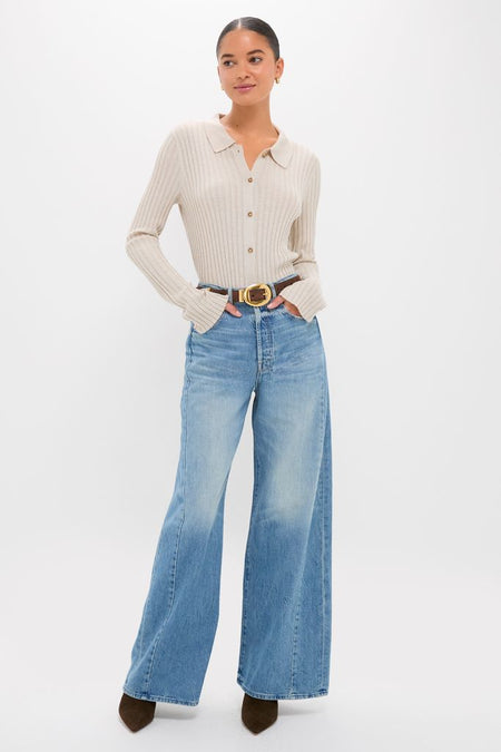 Model wearing the classic Folk Star The Pipe-Dream Button Sneak, an effortlessly chic rib-knit top with wide-leg jeans and high-end accessories for a fun, sophisticated look.