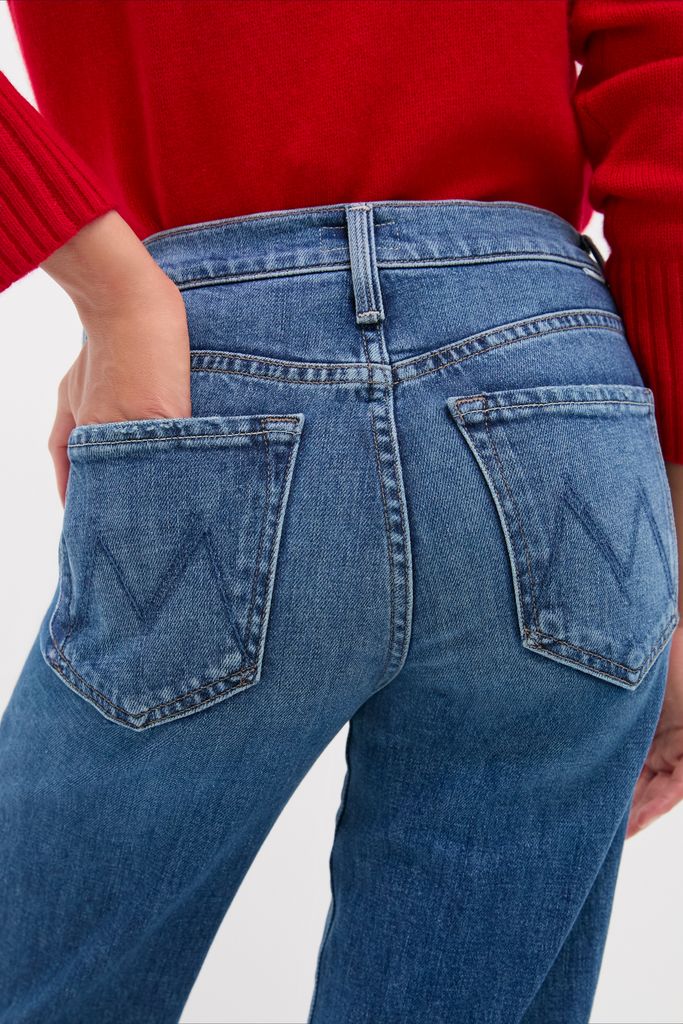 Tambourine Man The Mid Rise Rambler Zip Ankle jeans showcase a classic, effortless style with a fun, high-end appeal, perfect for confident, everyday wear.