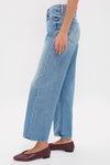 Folk Star The Dodger Flood jeans: classic, high-waisted, wide-leg cropped style paired with effortless burgundy slip-on shoes, embodying a fun, high-end look.