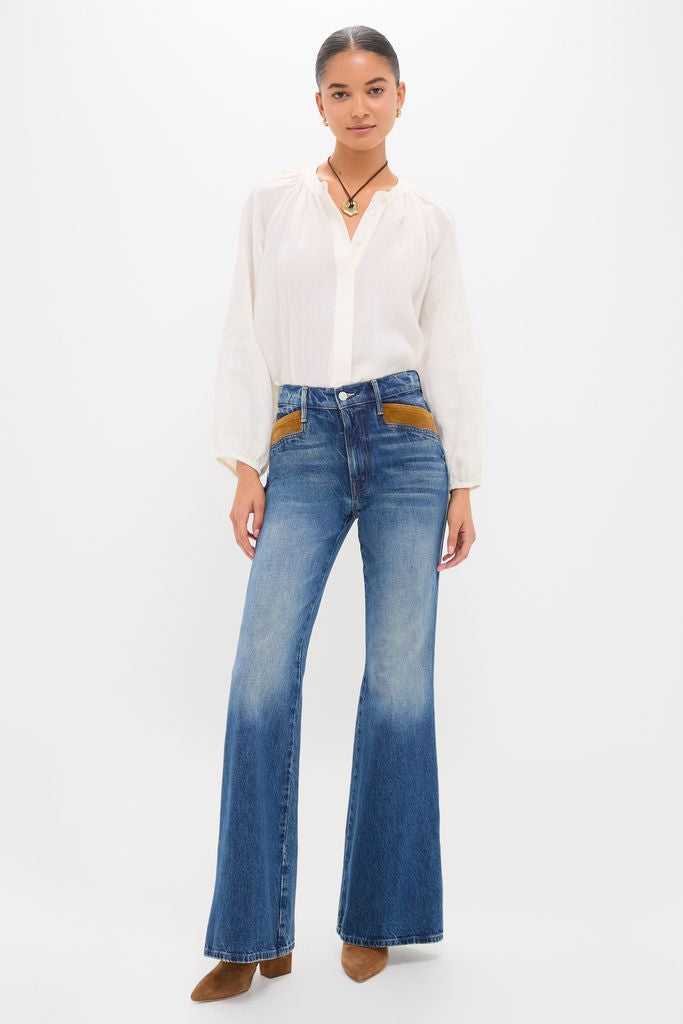 Woman wearing classic, effortless style featuring Remember When The Pointy Pocket Doozy Heel boots, paired with a loose blouse and high-waisted jeans with suede patch details.