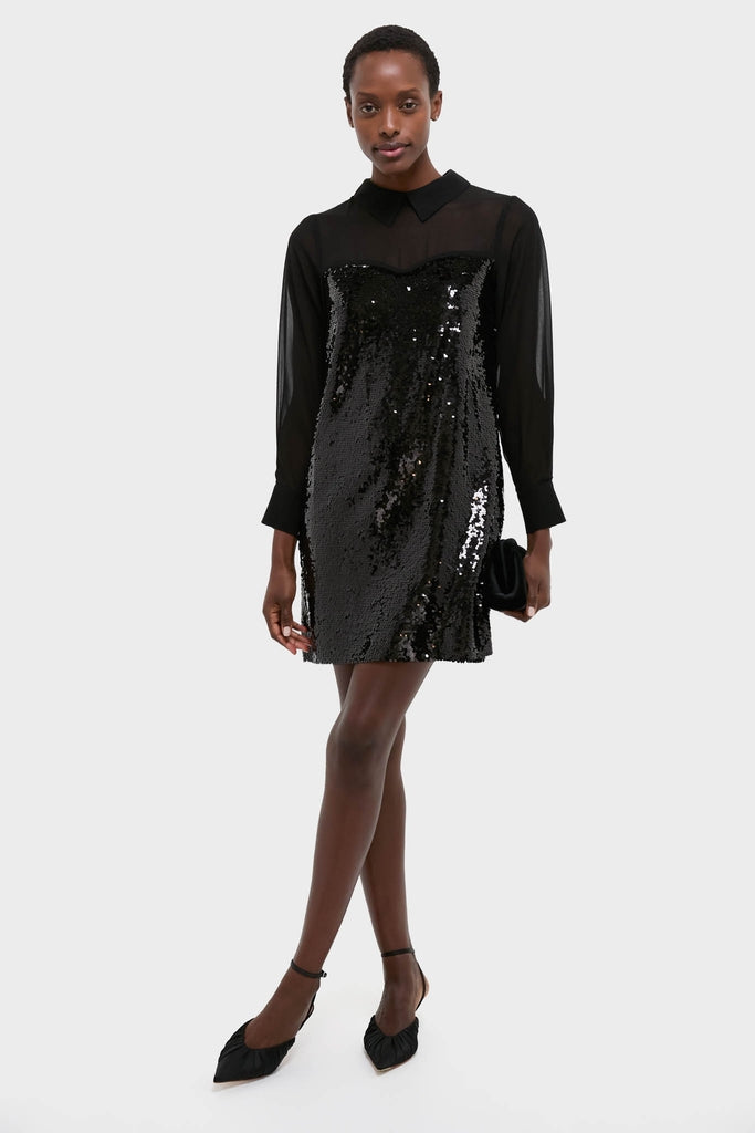 Black Sequin Josie Dress: A classic, high-end dress with glossy sequins and a sheer yoke, paired effortlessly with a black clutch and pointed sling-back flats.