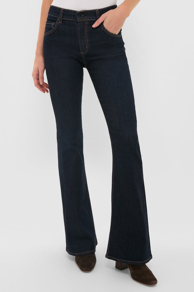 Indigo Resin Bond Street Jean, featuring a classic, effortless boot-cut with a polished flare. Paired with suede ankle boots, ideal for a high-end day-to-night transition.