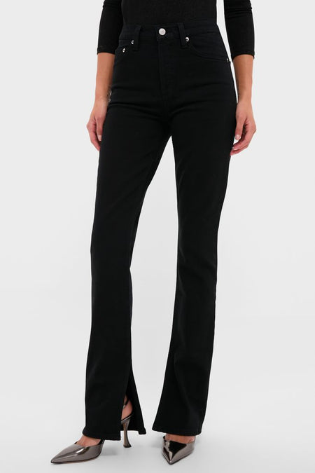 Immersion Ingram Split Skinny pants paired effortlessly with metallic stiletto heels, showcasing a classic, high-end look with fun, subtle ankle slits for a confident style.