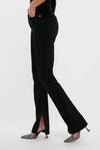 Immersion Ingram Split Skinny jeans offer a classic, effortless style with a slight flare and front slit, paired with high-end, fun metallic strappy heels.