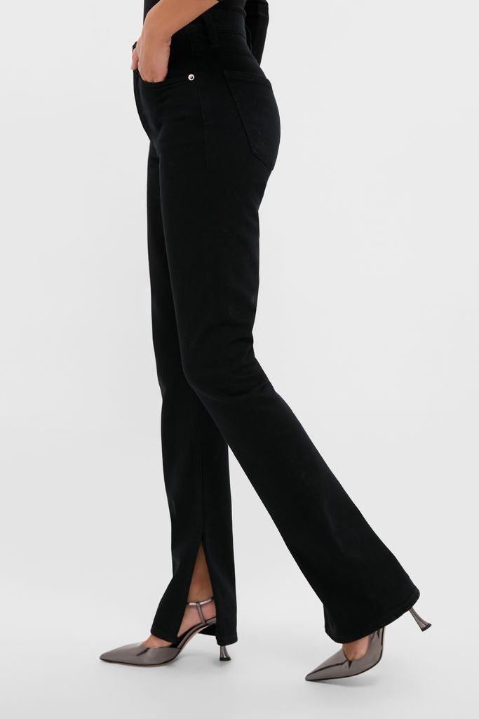Immersion Ingram Split Skinny jeans offer a classic, effortless style with a slight flare and front slit, paired with high-end, fun metallic strappy heels.