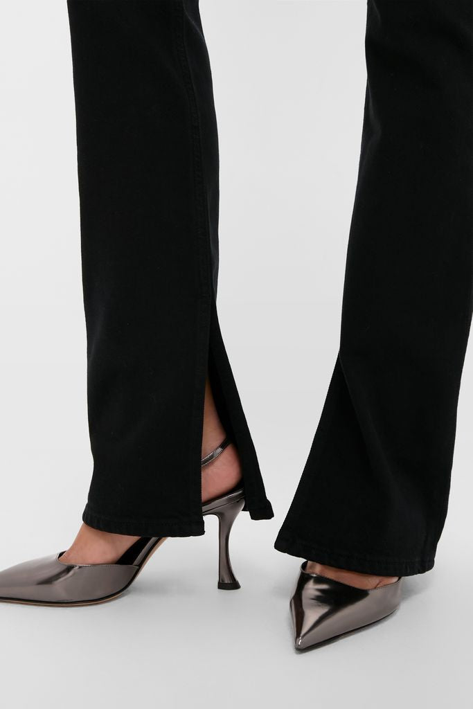 Immersion Ingram Split Skinny pants with a classic hem slit, paired with high-end metallic slingback heels, embodying an effortless and fun style for confident wear.