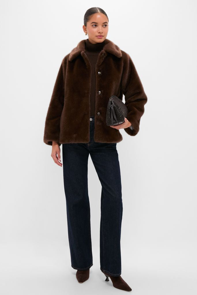 Model wears classic Dark Brown Faux Fur Brooke Cardigan with detachable collar, styled over a turtleneck. Effortless and high-end look paired with jeans and kitten-heel boots.