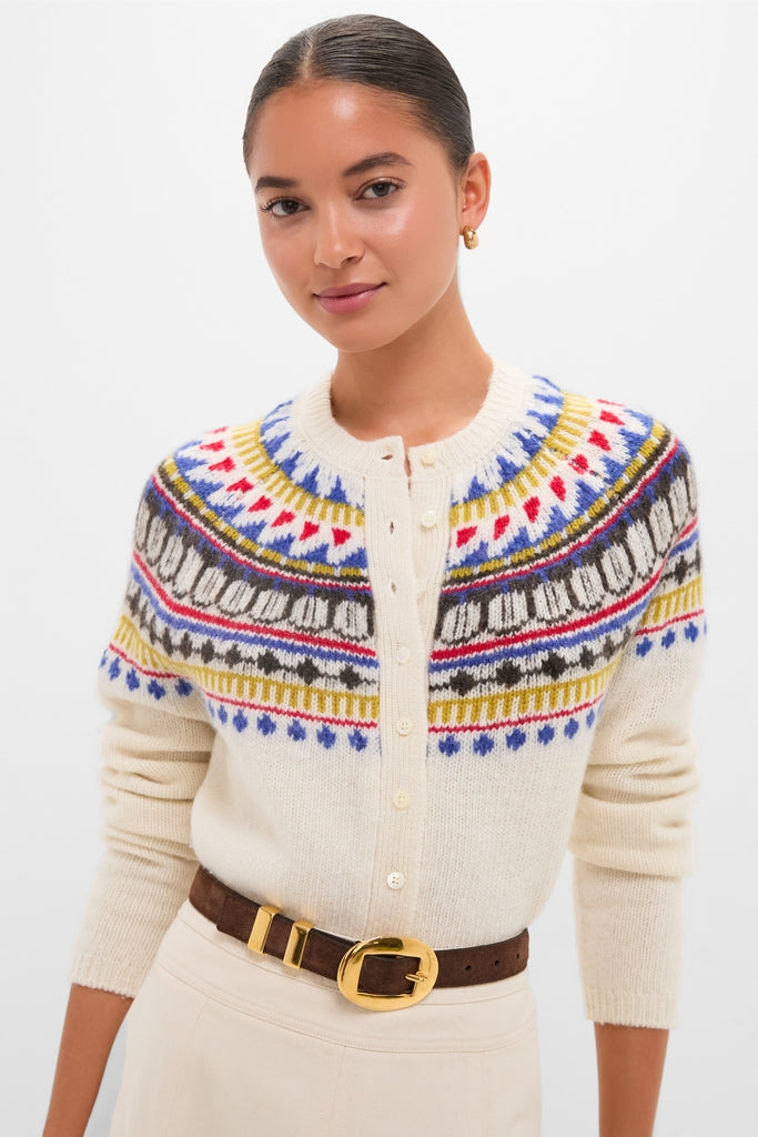 White Amina Fairisle Sweater exemplifies effortless style with its classic Fair Isle yoke, paired with a chic belt, perfect for a fun, high-end look.