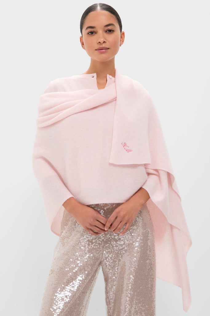 Model wearing the Ballet Slipper Cashmere Blanket Scarf draped elegantly, paired with high-waisted, sequined wide-leg pants, showcasing a classic and effortless high-end style.