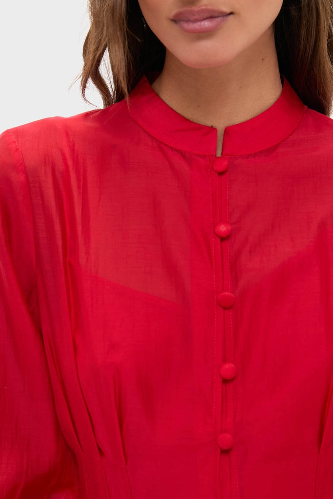 Effortlessly classic, the Red Organza Marbella Dress features a Mandarin collar and blouson sleeves, perfect for high-end, fun occasions.