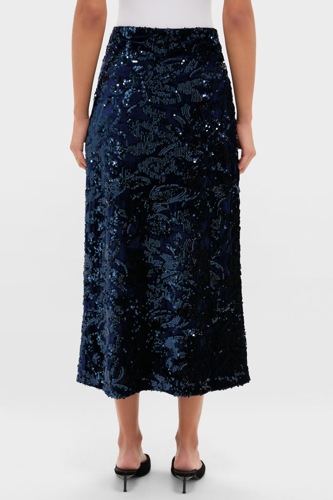 Velvet and Sequin Maloney Midi Skirt: Classic and high-end, this effortless, sequin-embellished navy skirt brings fun elegance to any event, perfect for making a shimmery statement.