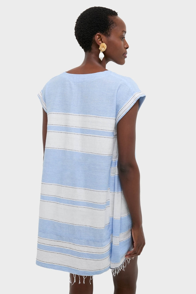 Debre Sky Elina Caftan with classic stripes and a fringed hem, creating an effortless, high-end A-line look. Perfect for fun beach-to-bar transitions.