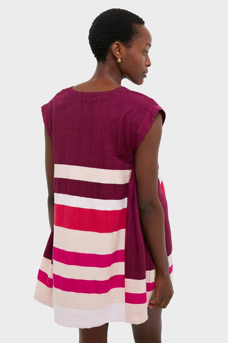 Model in Betami Cherry Elina Caftan, showcasing its classic, effortless A-line silhouette with color-block design. Perfect for fun, high-end vacation dressing.