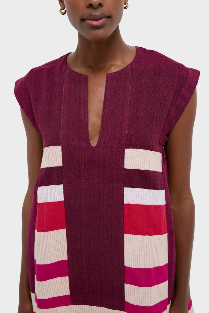 Betami Cherry Elina Caftan in burgundy with cream, white, red, and magenta blocks, featuring an effortless V-neck and A-line silhouette for classic, high-end vacation style.