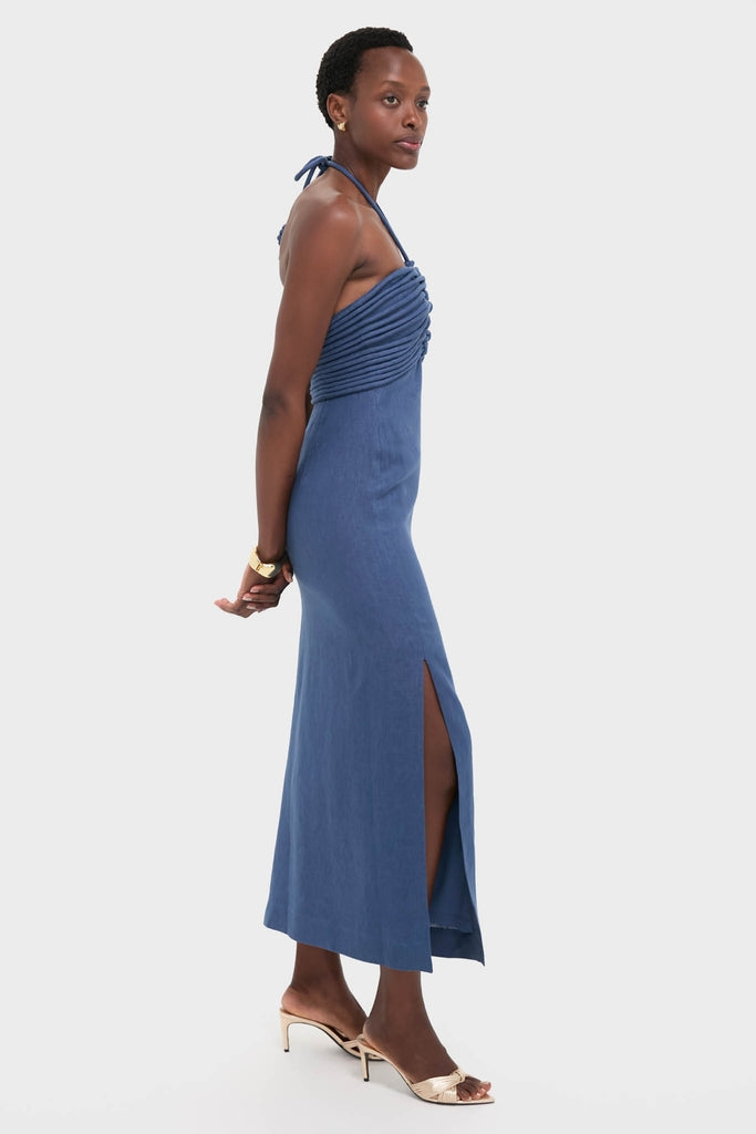 Indigo Mezcalitos Midi Dress: A classic, high-end sleeveless blue dress with a halter neck, ruched bust, side slit, styled with gold accessories for an effortless, fun look.