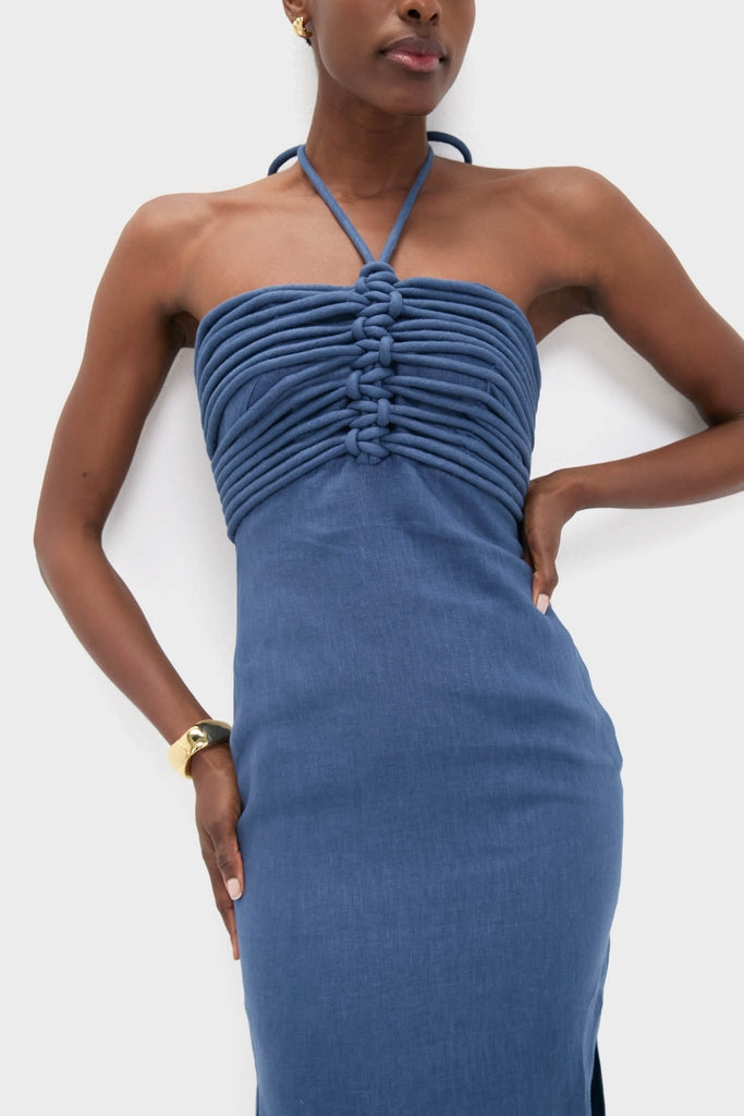 Indigo Mezcalitos Midi Dress: A classic, high-end linen dress with effortless halter neck and braided details. Perfect for fun nights out, exuding confidence and elegance.