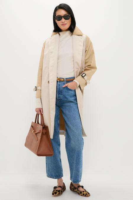 Woman in a classic, effortless ensemble wearing a medium-wash jean with the Saddle Hip to Waist Skinny Belt, exuding a high-end, fun style.