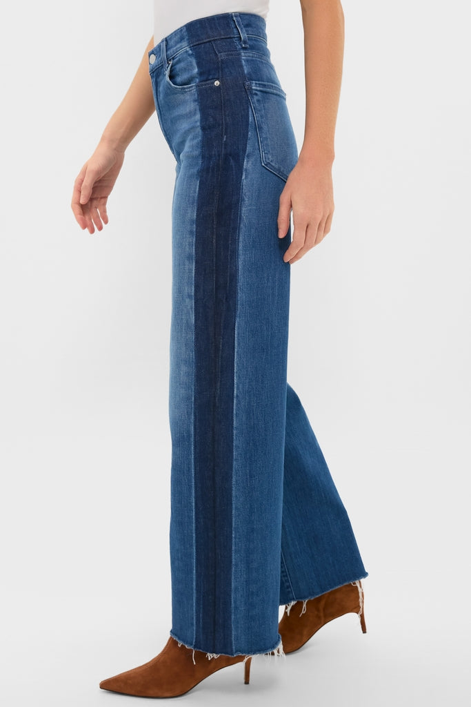 American Dream High Rise Column Jean features a classic, effortless style with two-tone wide legs and an unfinished hem, paired with fun, high-end suede stiletto boots.