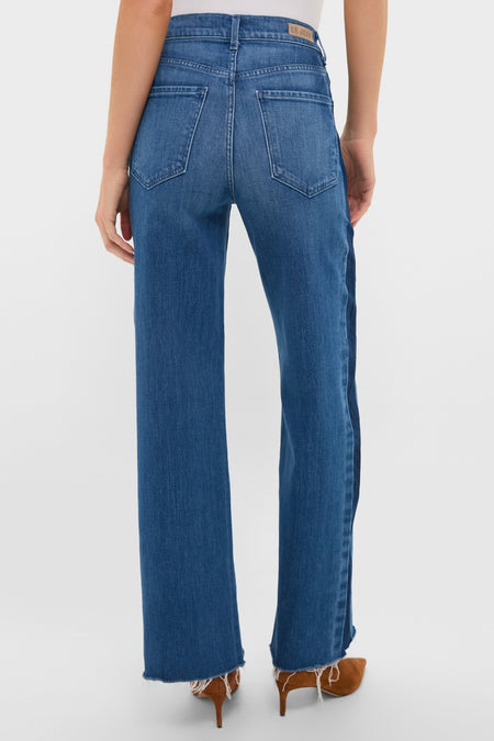 Classic and effortless, the American Dream High Rise Column Jean features a flattering fit, raw hem, and dual tone denim, embodying high-end, fun versatility.