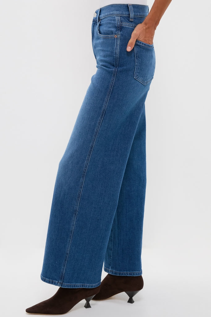 London Calling Juliette High Rise Wideleg jeans embody classic, effortless style with a high-rise fit and wide-leg cut, paired with chic suede ankle boots for a high-end look.