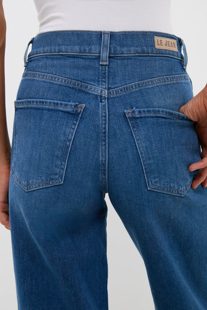 London Calling Juliette High Rise Wideleg jeans showcase a classic, effortless style with a high-rise, wide-leg fit and clean hem, perfect for versatile, high-end fashion.