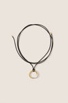 Mixed Lucy Williams Entwine Pendant Cord Necklace features a classic, effortless design with two-tone rings on an adjustable black cord, offering a fun, high-end look.