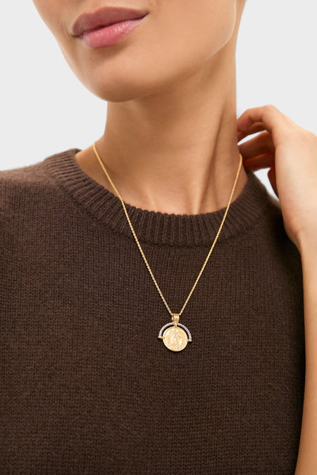 Classic and effortless, the Gold Lucy Williams Engravable Fortuna Arc Coin Pendant Necklace graces a neck, capturing an elegant, high-end charm with a fun, stylish touch.