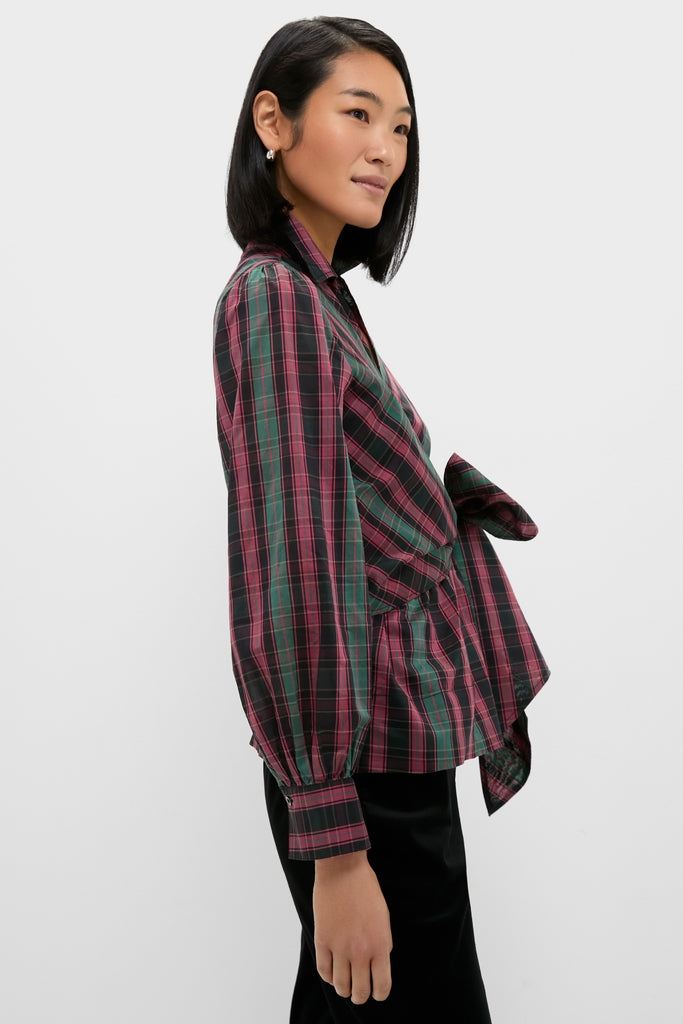 Woman models the Tartan Tie Front Bow Bea Blouse, featuring a classic wrap silhouette, peplum waist, and long balloon sleeves, epitomizing effortless, high-end style.