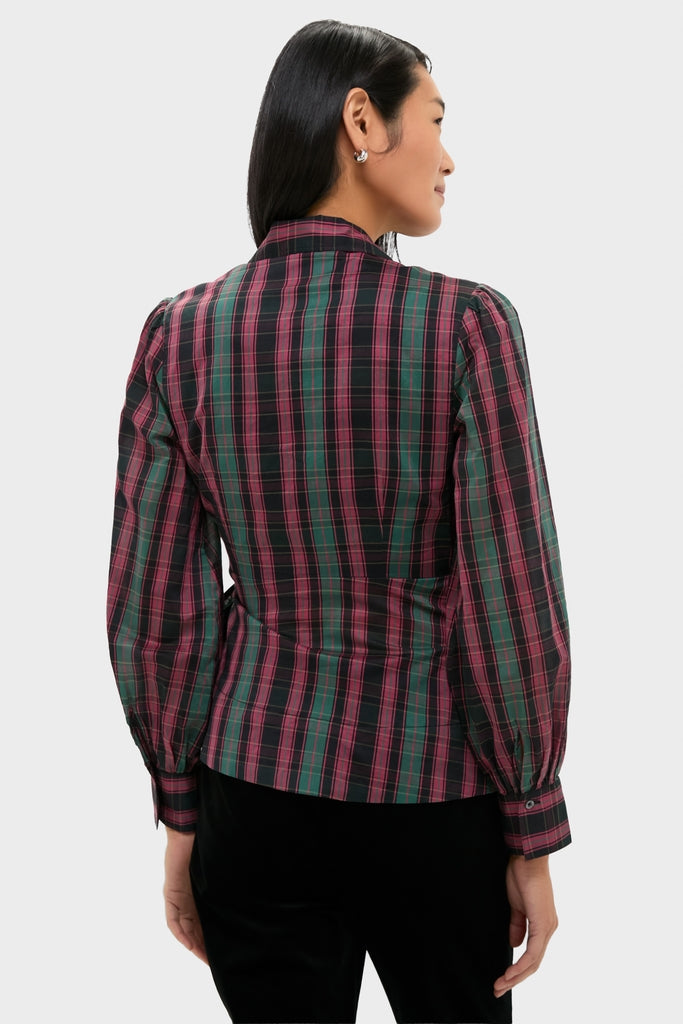 Model in a classic green-and-purple plaid Tartan Tie Front Bow Bea Blouse with puffed shoulders, showcasing its effortless, high-end style, paired with black trousers.