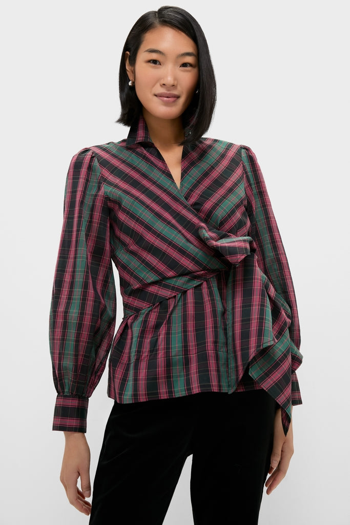 Woman in Tartan Tie Front Bow Bea Blouse, showcasing a classic, effortless wrap style with a chic asymmetric hem and self-tie bow, embodying high-end, fun fashion.