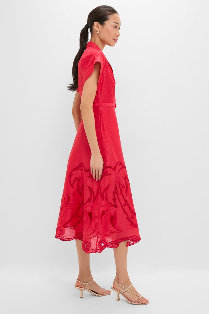Model in profile wearing the Scarlet Aubrey Applique Shirt Midi Dress, featuring a classic V-neck, cap sleeves, and an effortless A-line silhouette with a fun floral motif.