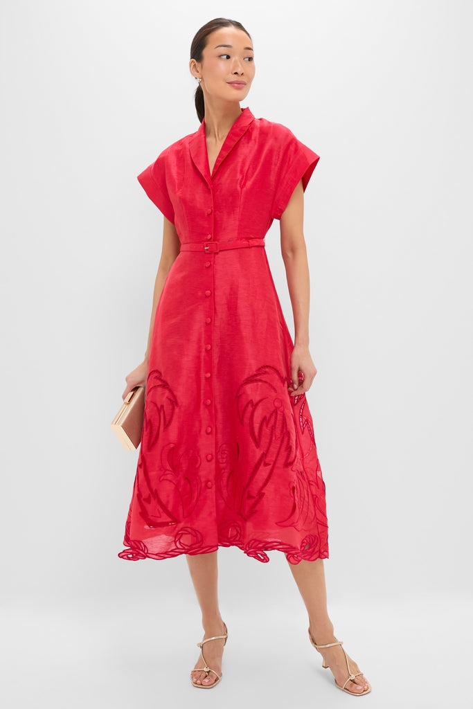 Model wearing the Scarlet Aubrey Applique Shirt Midi Dress, featuring classic cap sleeves, tonal detailing, and a self-belt, styled with a beige clutch and strappy sandals.