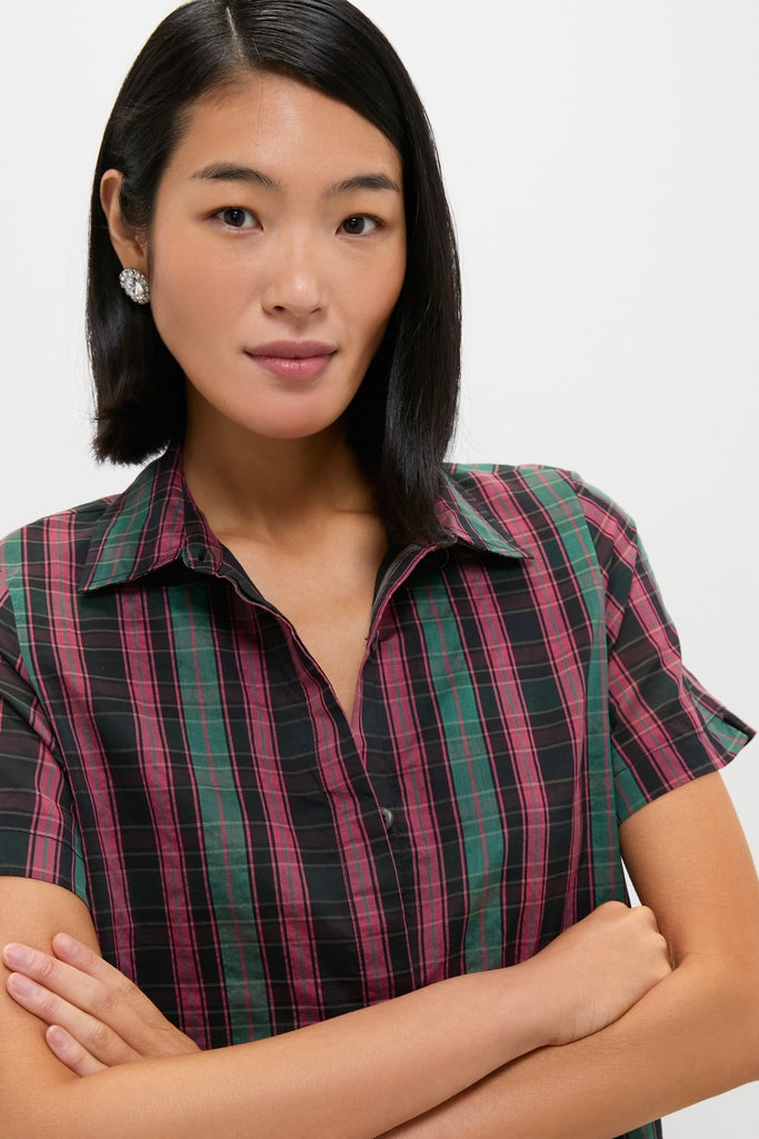Young woman models the Tartan Martine Maxi Bubble Dress, featuring a classic plaid, collared neckline, and bubble hem, embodying effortless, high-end style for fun, versatile wear.