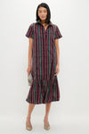 Tartan Martine Maxi Bubble Dress: Classic plaid midi with a drop-waist ruffle hem, exuding effortless and high-end style. Perfect for versatile, fun dressing.