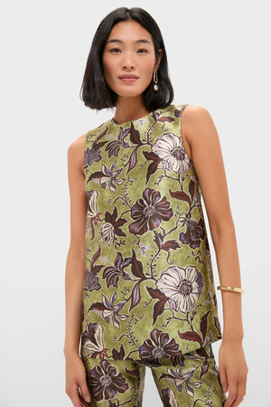 Woman models the classic Multi Citron Top, featuring an effortless floral print and relaxed silhouette, paired with matching pants for a high-end, fun look.