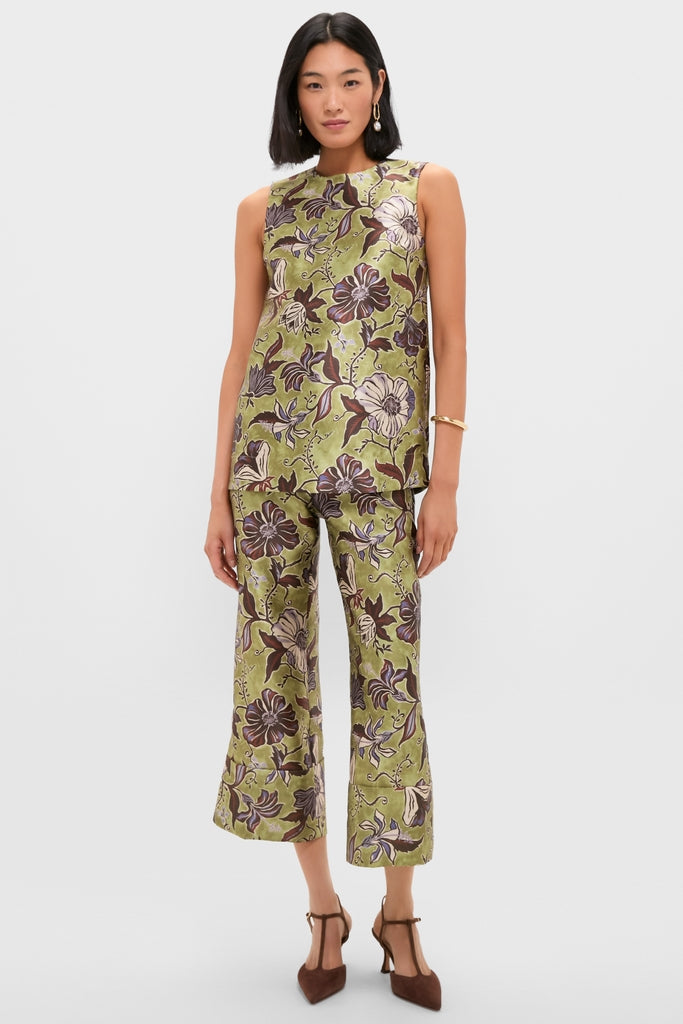 Model wearing the classic, effortless Multi Citron Top with a floral print, styled with matching pants and heels, exuding a fun, high-end fashion vibe.