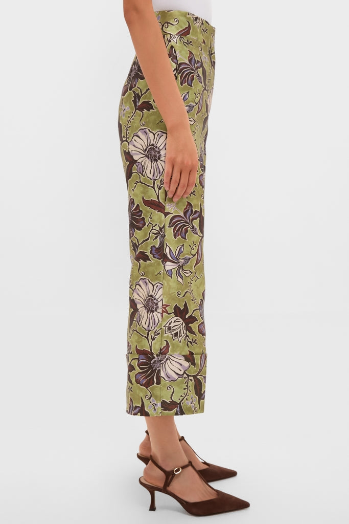 Side view of a model wearing classic Multi Citron Pants with a floral pattern, styled effortlessly with brown suede heels, showcasing a fun, high-end look.