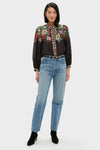 Model in classic Multi Viktoria Print Long Sleeve Blouse with floral embroidery, paired effortlessly with vintage jeans, black belt, and heeled ankle boots for a high-end, fun look.