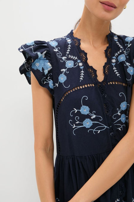 Exclusive Navy Edwina Embroidery Tunic Dress with intricate floral embroidery, lace trim, and ruffled sleeves, exudes a classic, effortless, high-end, and fun bohemian style.