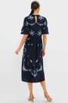 Exclusive Navy Edwina Embroidery Midi Dress with intricate floral embroidery and scalloped sleeves, exudes a classic, effortless elegance, perfect for a fun, high-end style.