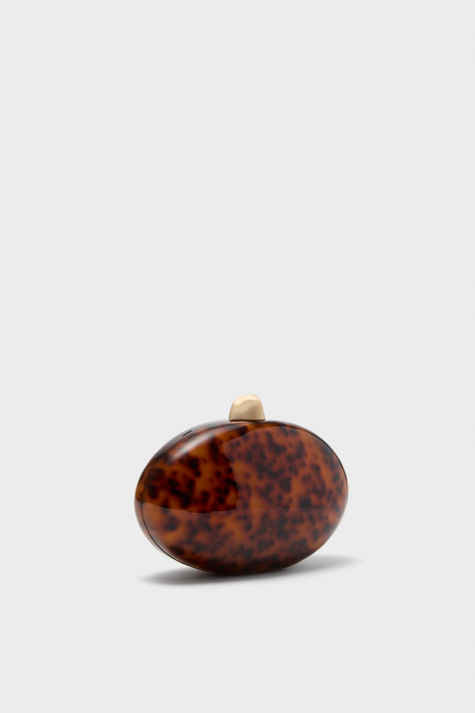 Caramel Tortoise Eviana Clutch: a high-end, classic tortoiseshell oval clutch with gold top clasp and removable chain, effortlessly blending sophistication and fun for elegant events.