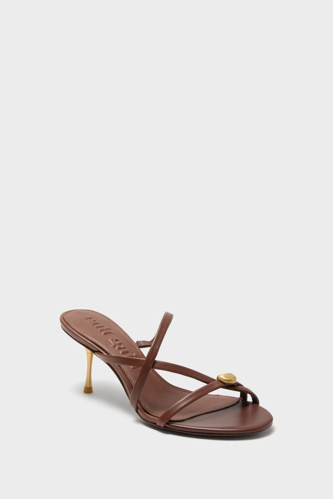 Saddle Valeska Sandals: Classic brown leather sandals with an effortless strappy toe-loop design, gold accent, and fun, high-end kitten heel.