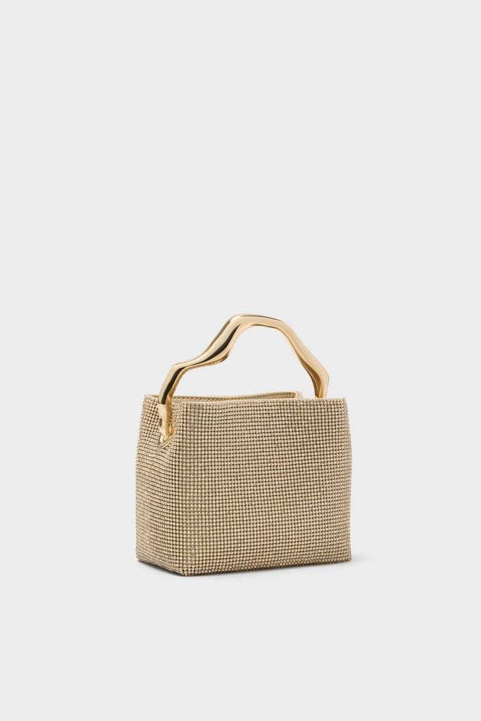 Sand Dollar Solene Mini Top Handle, a high-end, classic evening bag adorned with gold-toned rhinestones and a sculptural handle, exudes effortless glamour for fun, elegant occasions.