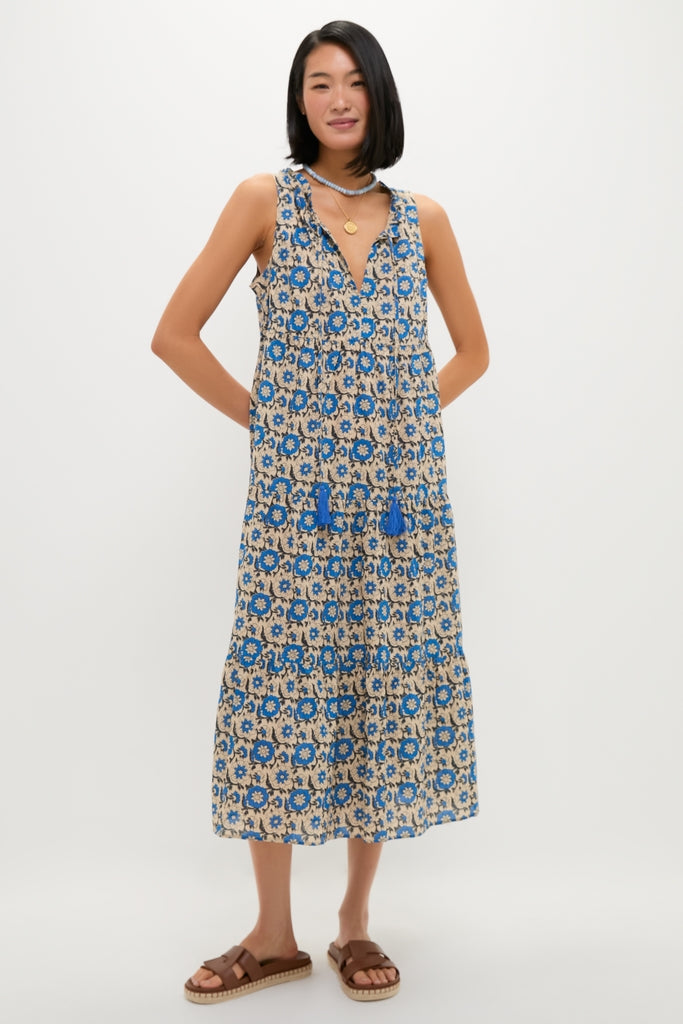 Cobalt Primose Salty Paloma Caftan: Classic boho sundress with cobalt-blue floral motifs, V-neck, tassel drawstring, and tiered skirt. Effortless elegance paired with fun, high-end style.